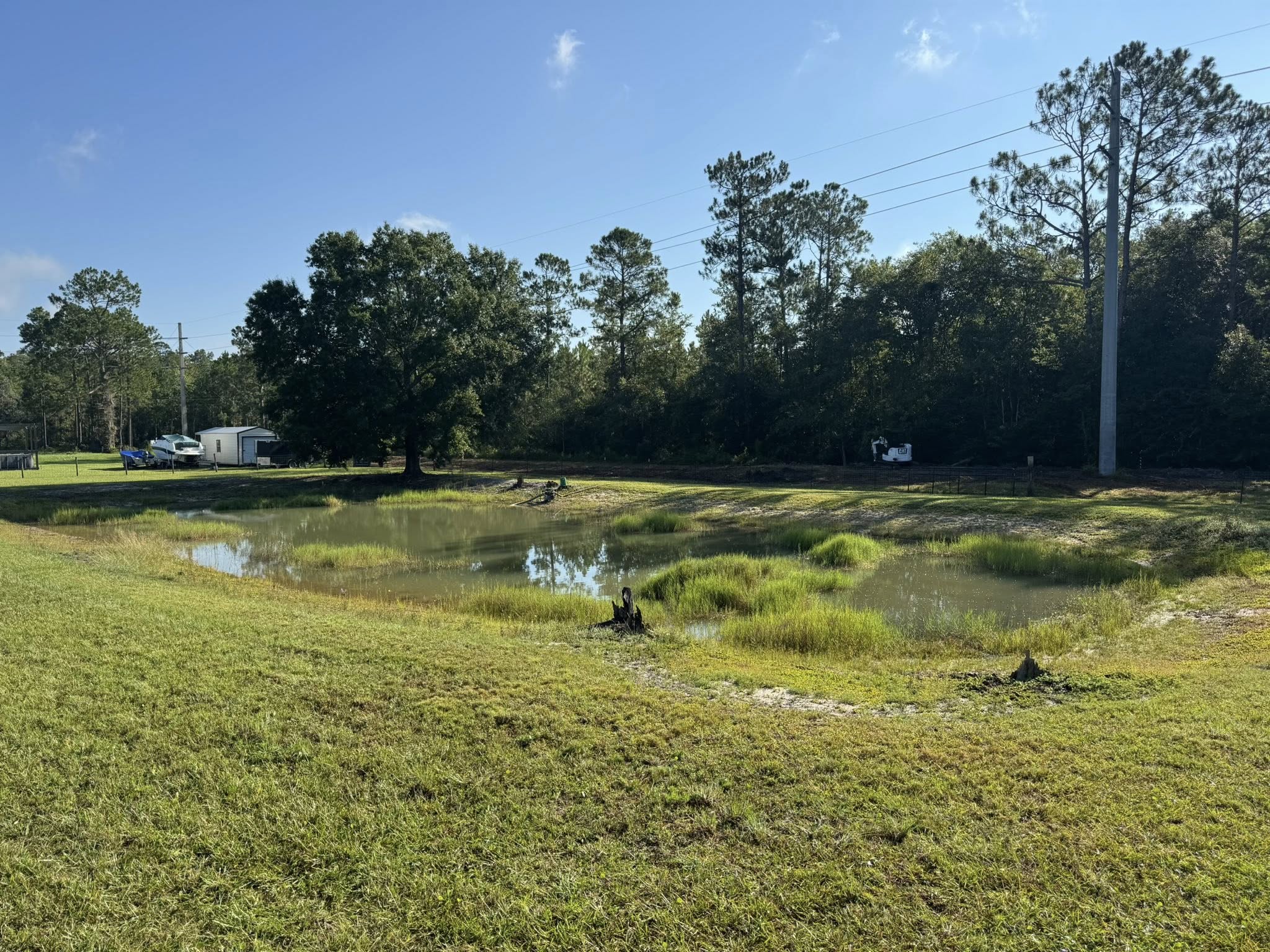Finished pond by DLC Land Clearing